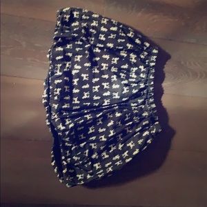 Full black skirt with white poodles.